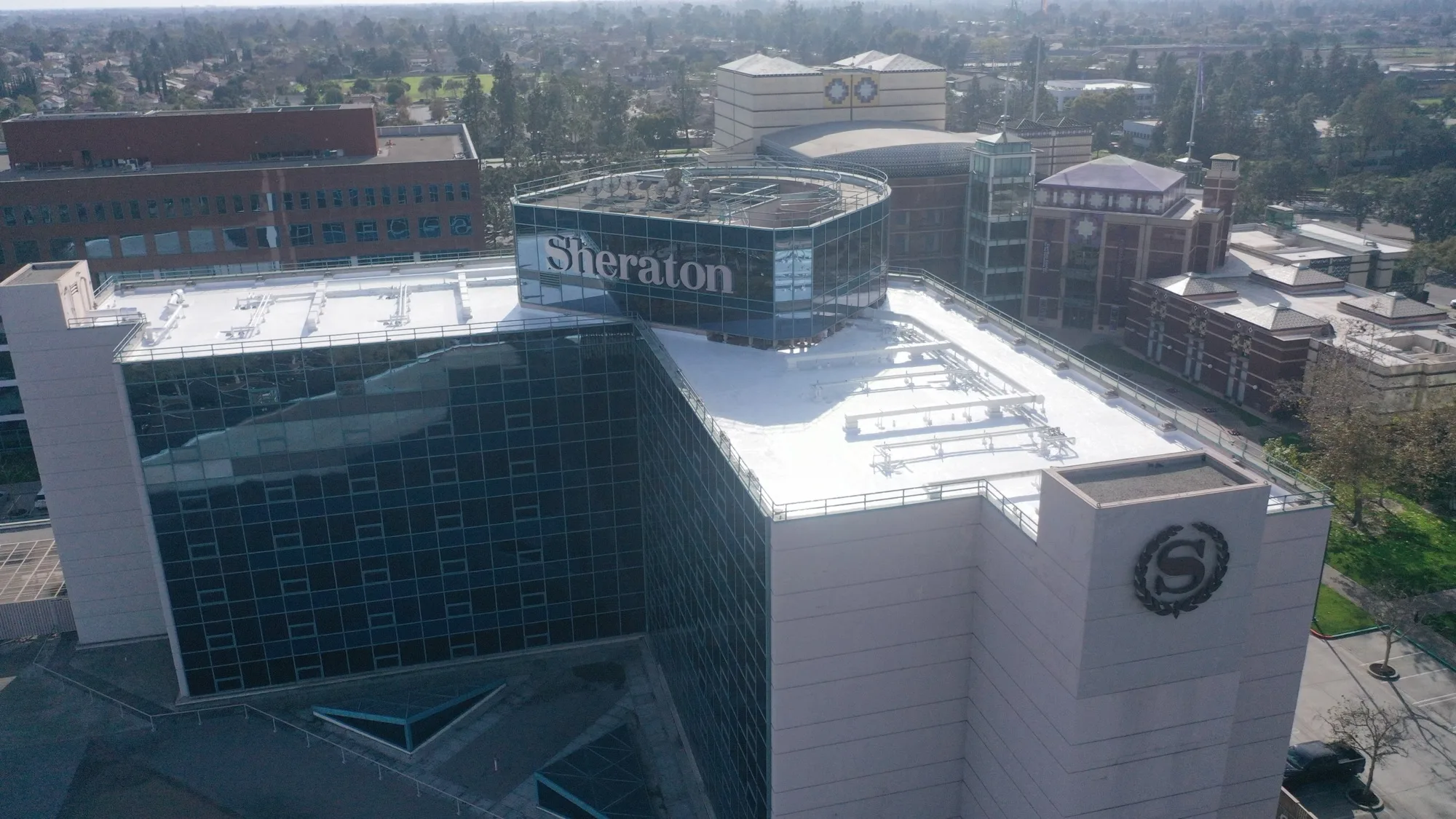 Flat-roof aerial over an occupied commercial building