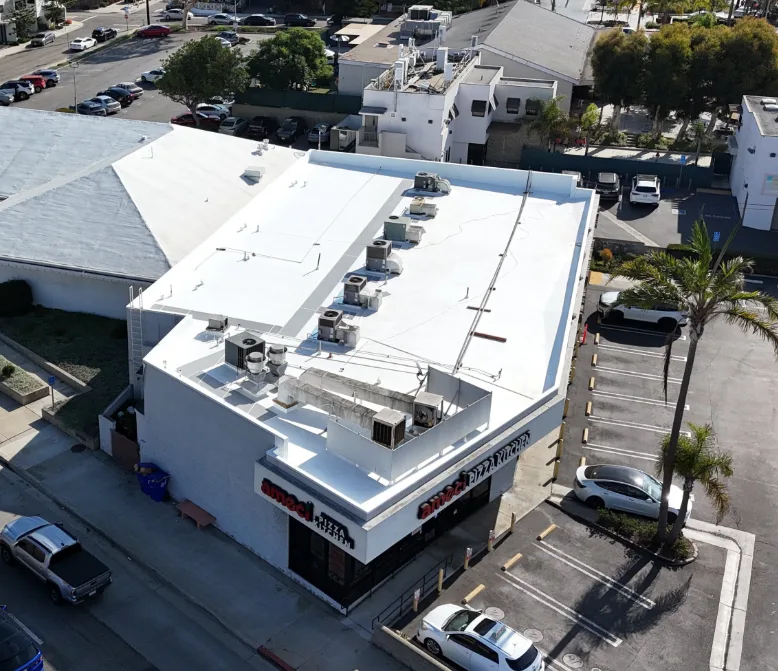 Commercial building with a flat white roof